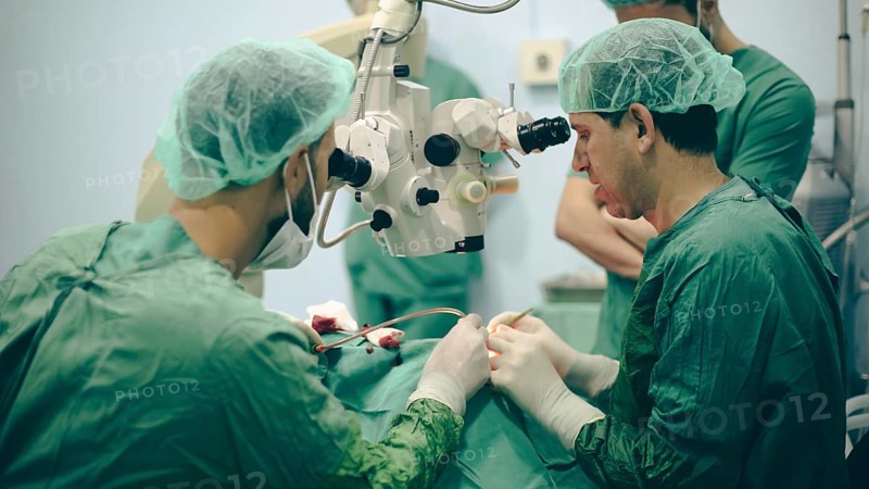 Several doctors performing a complex surgical operation inside an operating room for a displaced patient. Aleppo, Syria. October 18, 2022, Aleppo, Syria