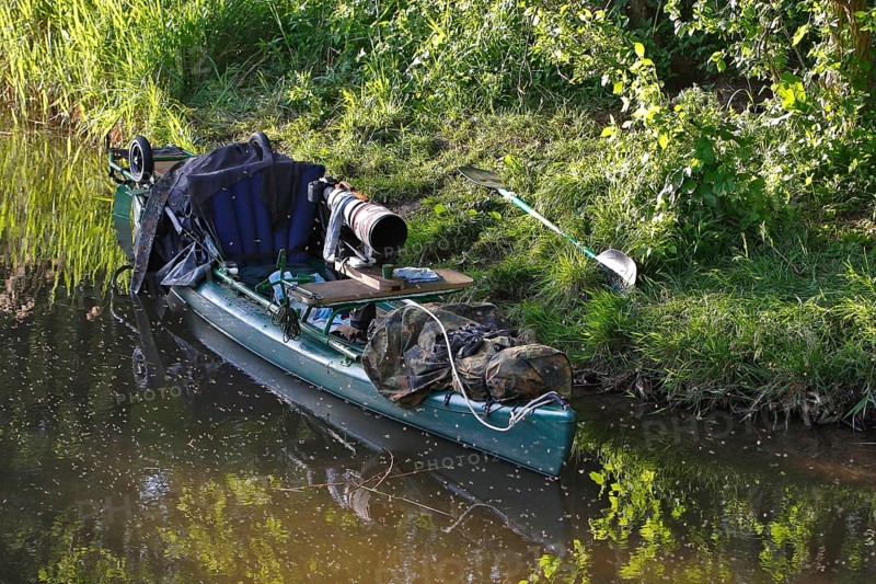 Kayak of a nature photographer in the water, Müritz National Park, Mecklenburg-Western Pomerania, Germany