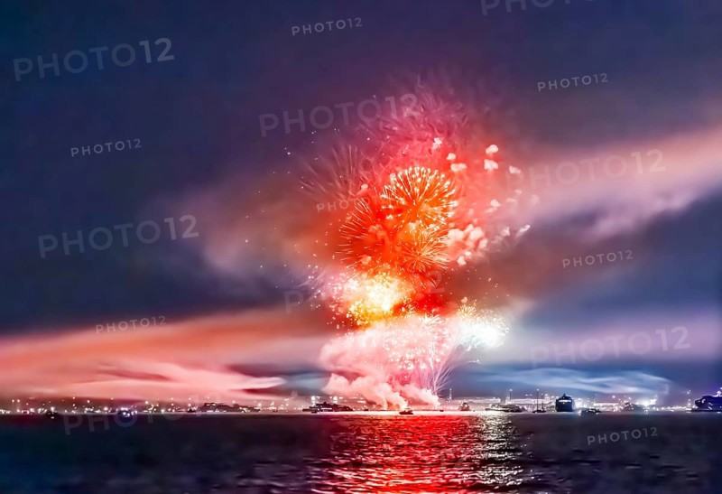 Lake Night Festival Constance. Water fireworks over the German shore and the neighbouring Swiss town of Kreuzlingen. View of the fireworks from Lake Constance. Constance, Baden-Württemberg, Germany
