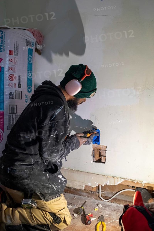 Detroit, Michigan - Workers remodel a house in the Morningside neighborhood that had been vacant for many years. Detroit lost nearly two-thirds of its residents from 1950 to 2020 but has been growing modestly in recent years