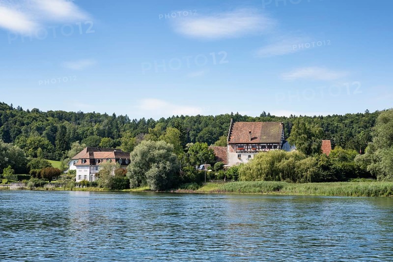 View over the Rhine, Hochrhein to the historic Bibermühle mill near Rheinklingen, Canton Thurgau, Switzerland