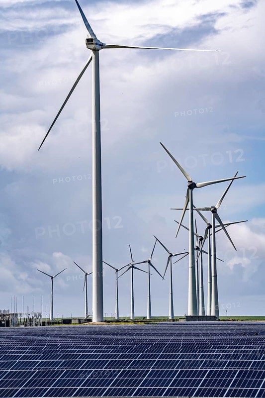 Vopak Solarpark Eemshaven, 19 hectares of solar modules with a capacity of 25 megawatts, around the Vopak tank terminal in the industrial harbour of Eemshaven, wind farm, Netherlands