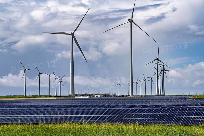 Vopak Solarpark Eemshaven, 19 hectares of solar modules with a capacity of 25 megawatts, around the Vopak tank terminal in the industrial harbour of Eemshaven, wind farm, Netherlands