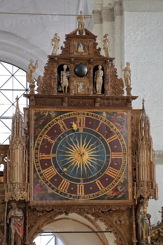 Rood screen with Gothic clock built in 1477 with decorations and figures, interior view, church clock, detail, clock face, Lübeck Cathedral, Schleswig-Holstein, Germany