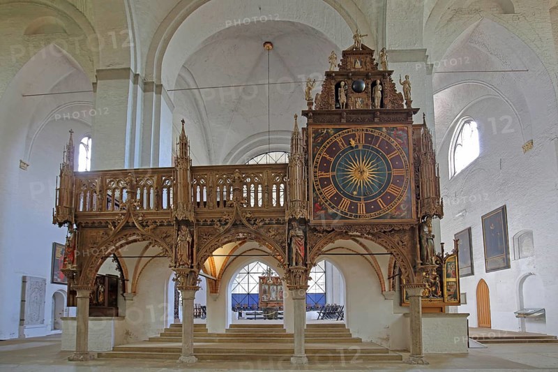 Rood screen with Gothic clock built in 1477, interior view, church clock, Lübeck Cathedral, Schleswig-Holstein, Germany