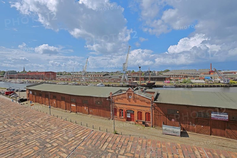 View of sheds 8 and 9 at the Hansa harbour, Stadttrave, cityscape, harbour, harbour crane, Marstallweg, old town, Lübeck, Schleswig-Holstein, Germany