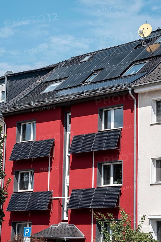 Residential building with photovoltaic modules on the façade and roof, North Rhine-Westphalia, Germany