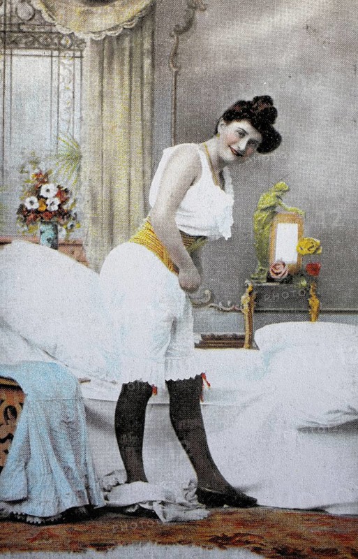 Female nude from around 1899, erotic postcard, playgirl, woman in historical underwear dressing in a stylish bedroom, coloured, reproduction of a photo from around the turn of the century, historical, digitally restored reproduction of an old original, exact date unknown
