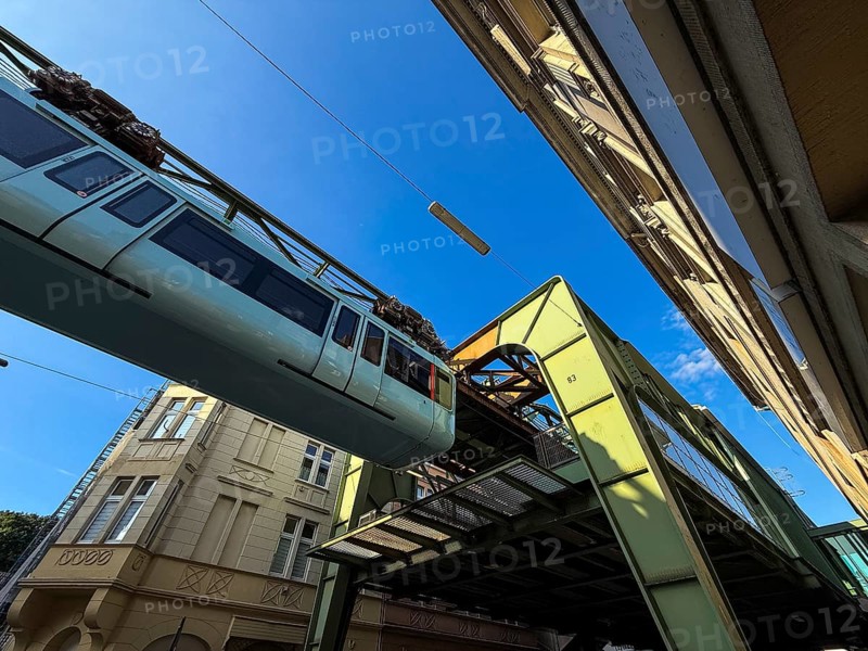 The Wuppertal suspension railway arrives at the Sonnborn stop, Wuppertal, Germany
