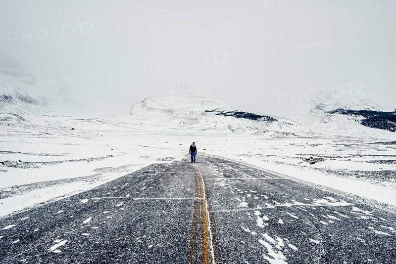 Winter road trip on the Icefields Parkway with lots of snow and ice, Banff National Park, Jasper National Park, Alberta, Canada