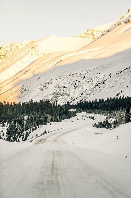 Winter road trip on the Icefields Parkway with lots of snow and ice, Banff National Park, Jasper National Park, Alberta, Canada