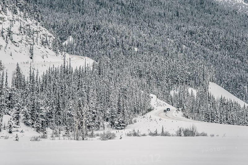 Winter road trip on the Icefields Parkway with lots of snow and ice, Banff National Park, Jasper National Park, Alberta, Canada