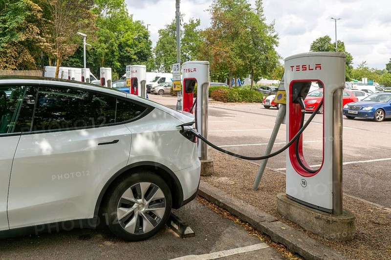 Charging point facility for Tesla electric vehicles at service station, M25 South Mimms services, Hertfordshire, England, UK