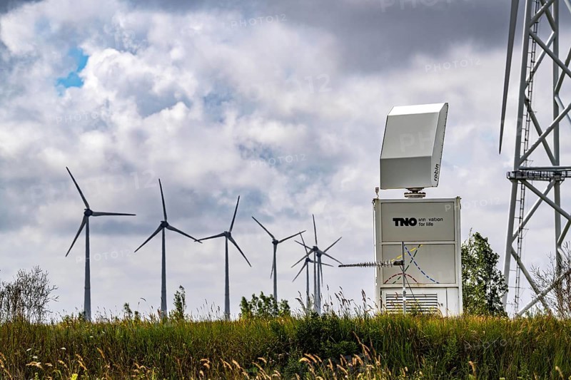 Wind farm in Eemshaven, radar system of the Dutch manufacturer Robin, bird radar, here type Robin Max Radar, detects birds and flocks of birds up to 15 km away in order to switch off wind turbines if necessary to avoid collisions and minimise damage, Netherlands