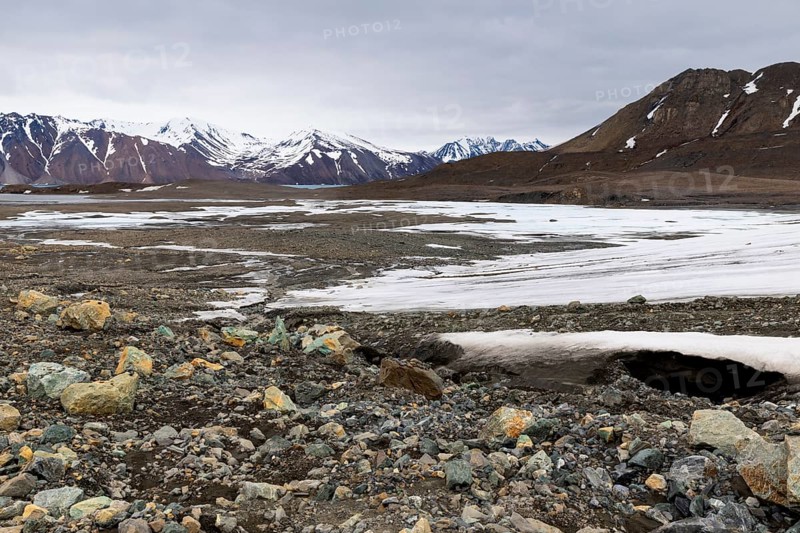 Melting glacier, rocks, water, mountain range, Cooper Camp, Spitsbergen, Svalbard