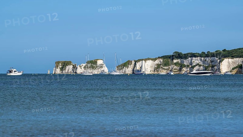 Boats on sea over Knoll Beach Studland, Poole, Dorset, England, United Kingdom