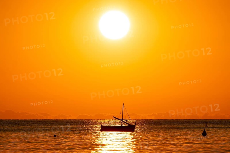 The sun rises on the Costa Rei, a stretch of coastline on the Italian Mediterranean island of Sardinia, Monte Nai, Costa Rei, Sardinia, Italy