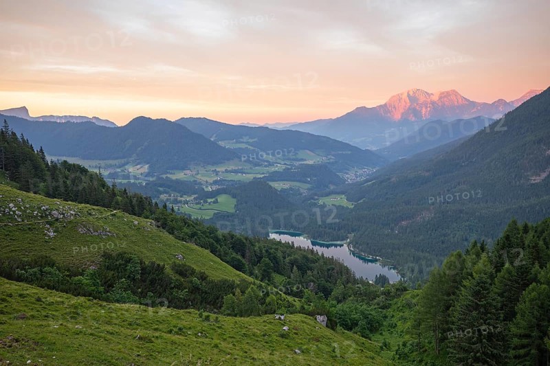 Magical sunset at the Halsalm above the Hintersee with views of the Hoher Göll and Untersberg mountains