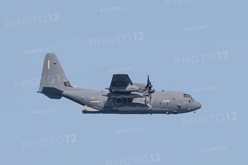 A Lockheed Martin MC-130J Commando II, a US Air Force military aircraft, flies low over Costa Rei, a coastal area of the Italian Mediterranean island of Sardinia, Monte Nai, Costa Rei, Sardinia, Italy