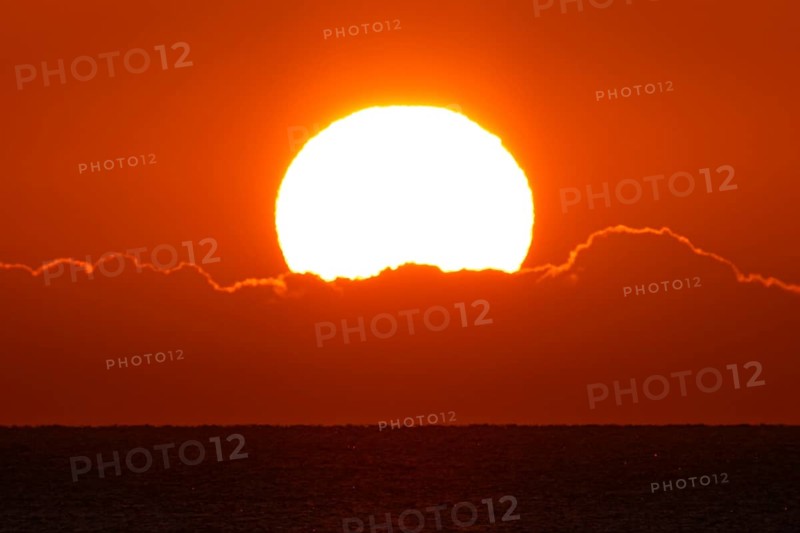 The sun rises on the Costa Rei, a stretch of coastline on the Italian Mediterranean island of Sardinia, Monte Nai, Costa Rei, Sardinia, Italy