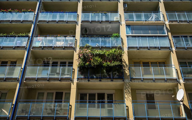 Balcony filled with flowers and plants on an apartment building in the city centre of Bratislava, Slovakia