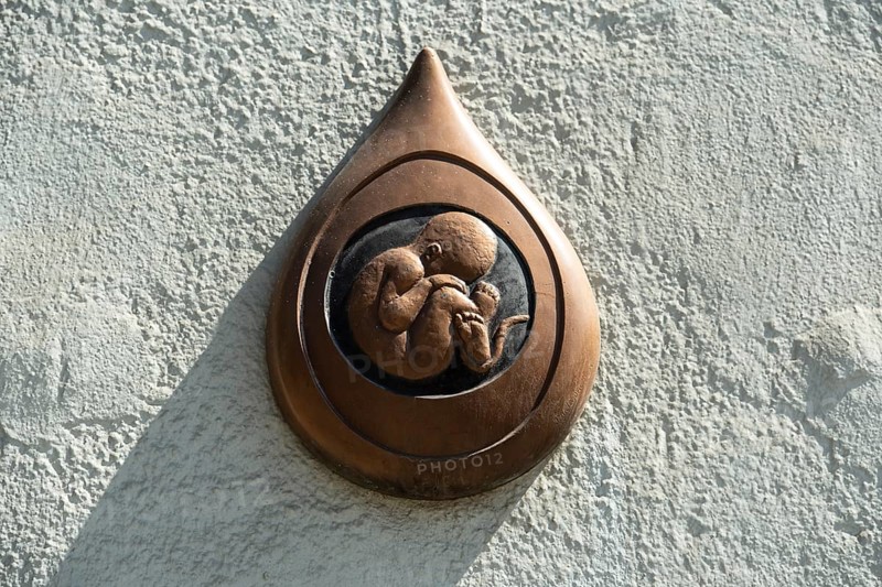 Commemorative picture against abortion on a house in Bratislava, Slovakia