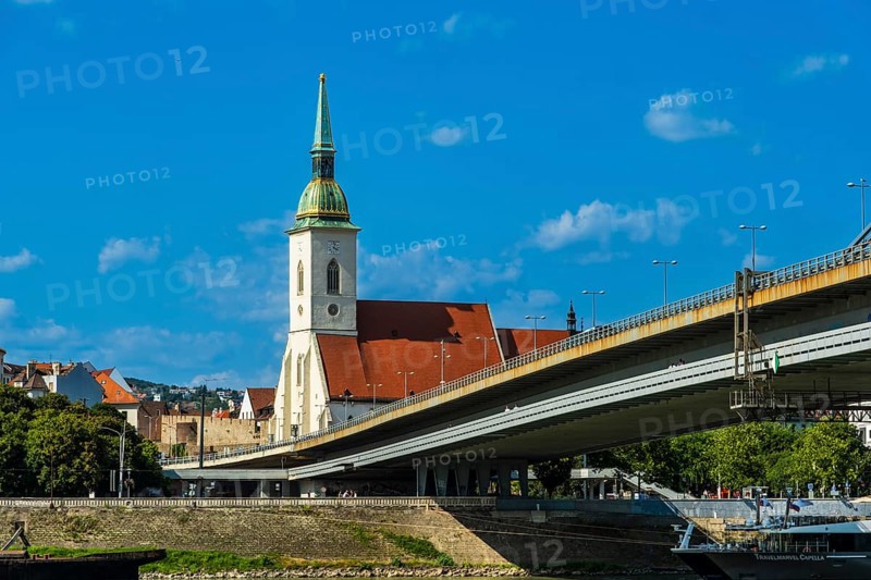St Martin's Cathedral in Bratislava, in the foreground the Danube and the Bridge of the Slovak National Uprising in Bratislava, Slovakia