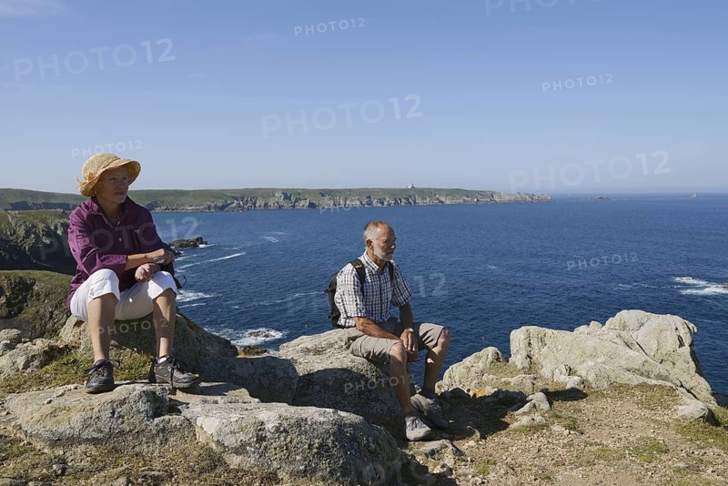 Man and woman on the cliffs, Cap Sizun, Finistere department, Brittany, France