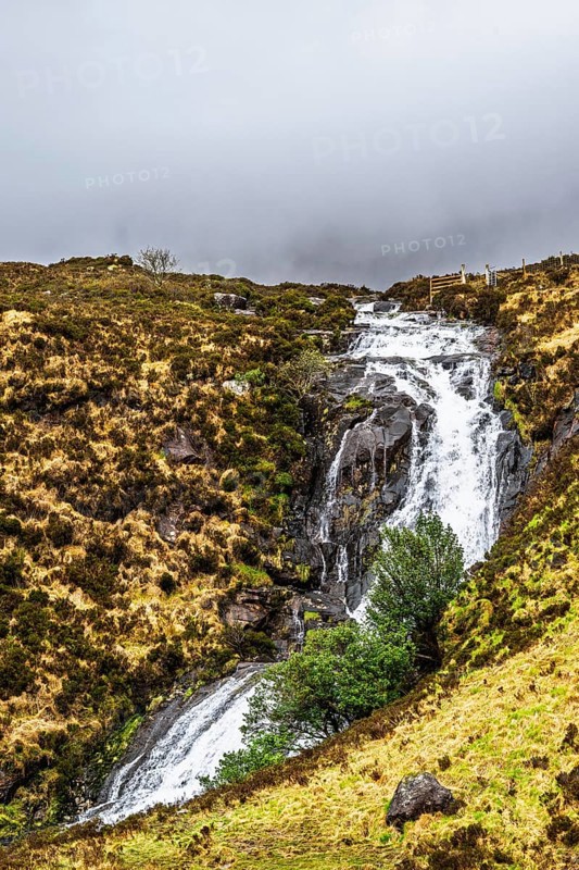 Eas a' Bhradain waterfall, Red Cuillin mountains, Loch Ainort, Isle of Skye, Scotland, UK
