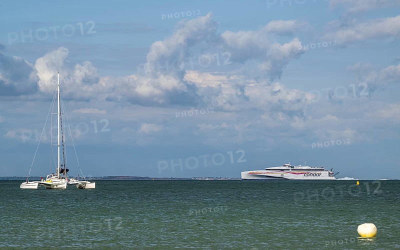 Boats on sea over Knoll Beach Studland, Poole, Dorset, England, United Kingdom