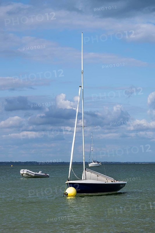 Boats on sea over Knoll Beach Studland, Poole, Dorset, England, United Kingdom