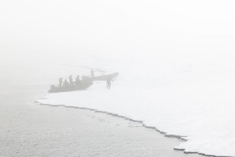 Zodiac with guides lands, Ice Edge, Sea, Spitsbergen, Svalbard