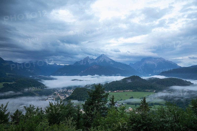 Marxenhöhe near Berchtesgaden with Watzmann view and morning mist after the rain