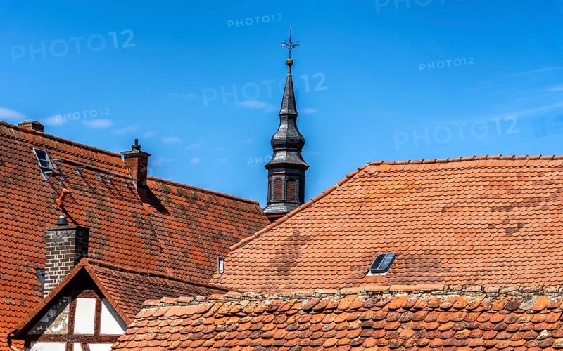 The old town centre with half-timbered houses, church towers and remains of the town wall in Büdingen, Hesse, Germany