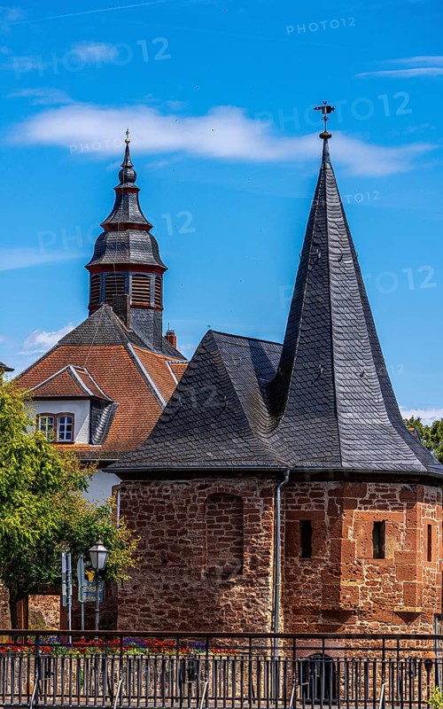The old town centre with the town wall and the Seemenbach stream, Büdingen, Hesse, Germany