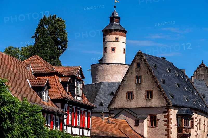 The old castle with Barbarossaplatz and the castle café in the old town centre of Büdingen, Hesse, Germany