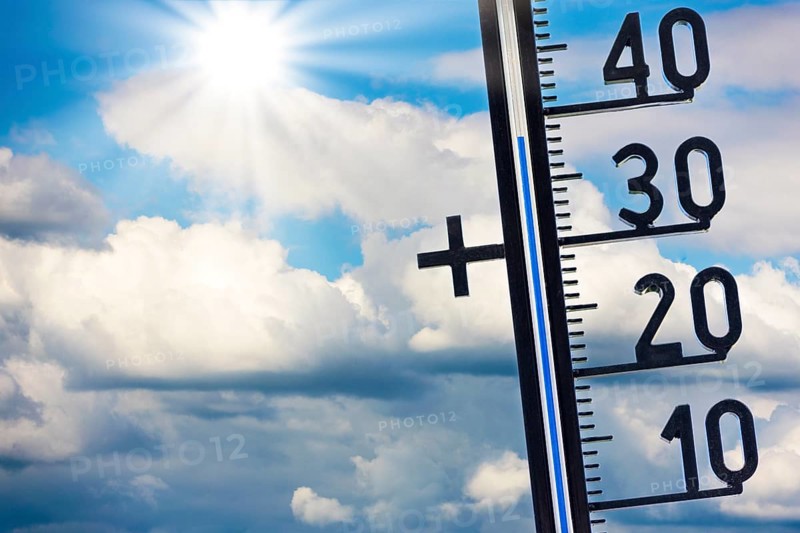 Symbolic image, global warming, thermometer shows high temperatures under a sunny sky with clouds, Baden-Württemberg, Germany