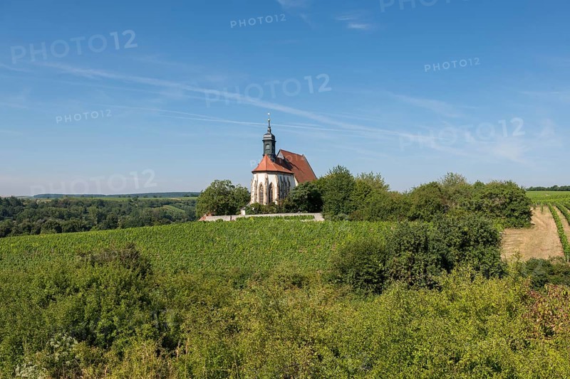Pilgrimage church Maria im Weingarten, stands in a picturesque setting, surrounded by green hills and clear skies, near Volkach am Main, Lower Franconia, Mainfranken, Bavaria, Germany