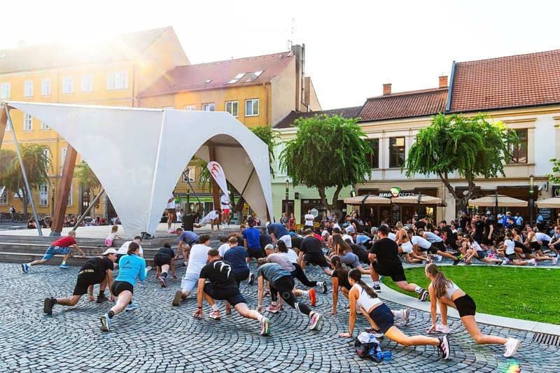 An event by a local fitness centre takes place on a stage on Peace Square, Capital of Culture 2026, Trencín, Slovakia