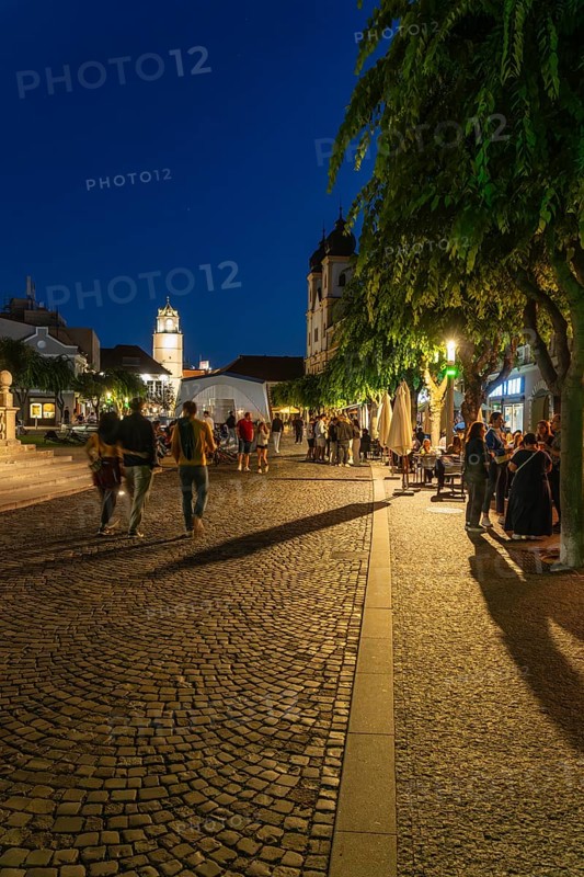 Night shot of the Peace Square in the old town centre of Trencín, in the background the Piarist Church of St. Francis Xavier, Capital of Culture 2026, Trencín, Slovakia