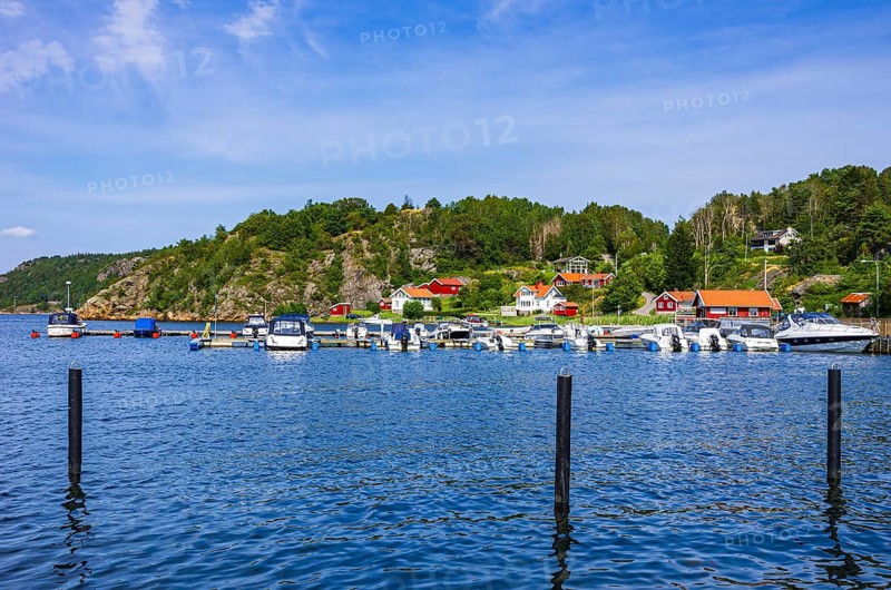 Coastal landscape with housing estate and marina in Henan, Orust, Bohuslän, Västra Götalands län, Sweden