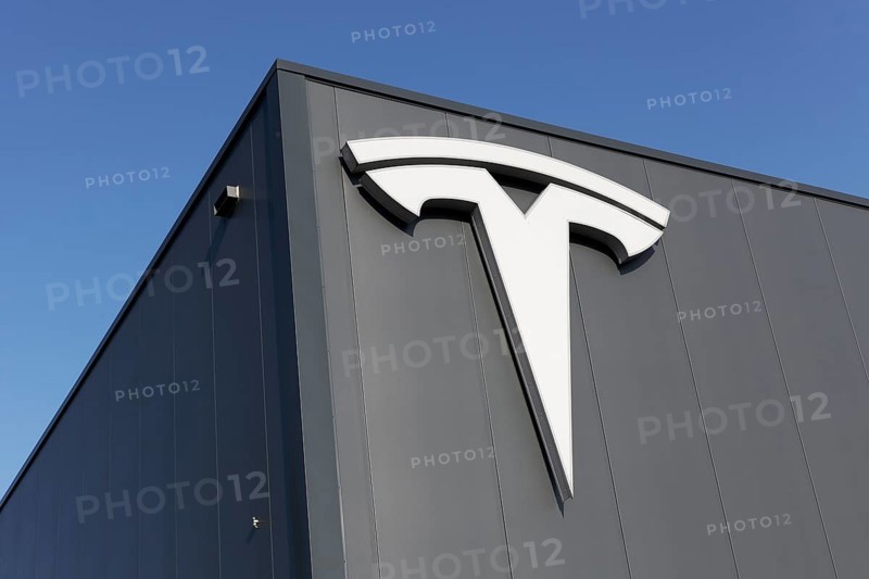 Tesla, logo on modern workshop building, figurative mark without lettering, US car manufacturer for electric cars, Krefeld-Linn, North Rhine-Westphalia, Germany