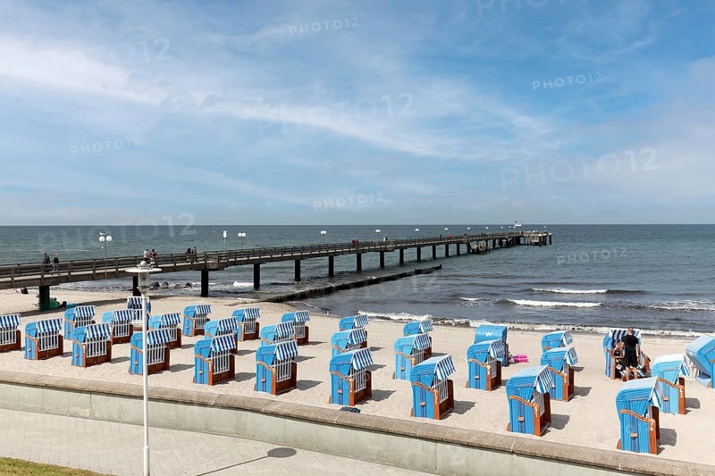 Pier and beach with closed beach chairs, blue sky, Kühlungsborn, Baltic Sea, Mecklenburg-Western Pomerania, Germany