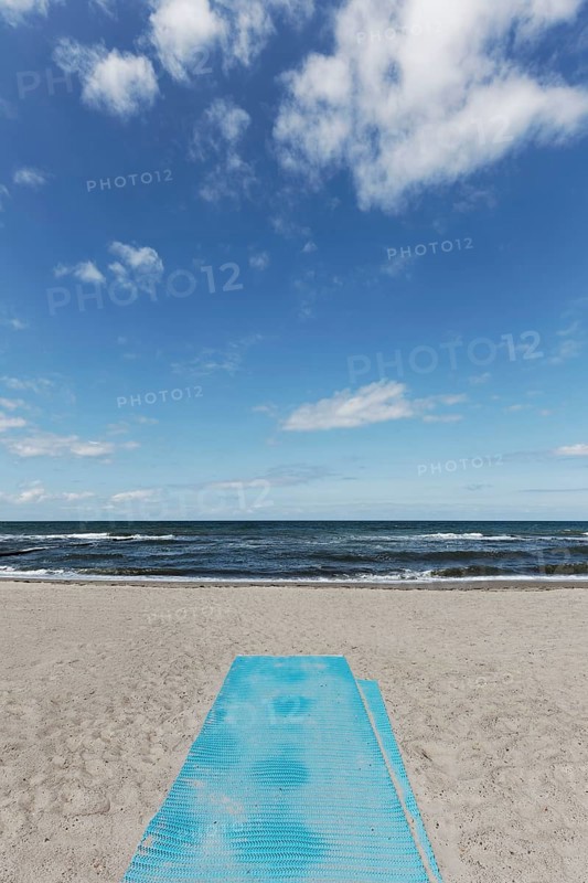 Deserted beach with blue sand mat for barrier-free beach access, blue sky, Kühlungsborn, Baltic Sea, Mecklenburg-Western Pomerania, Germany