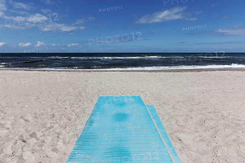 Deserted beach with blue sand mat for barrier-free beach access, blue sky, Kühlungsborn, Baltic Sea, Mecklenburg-Western Pomerania, Germany