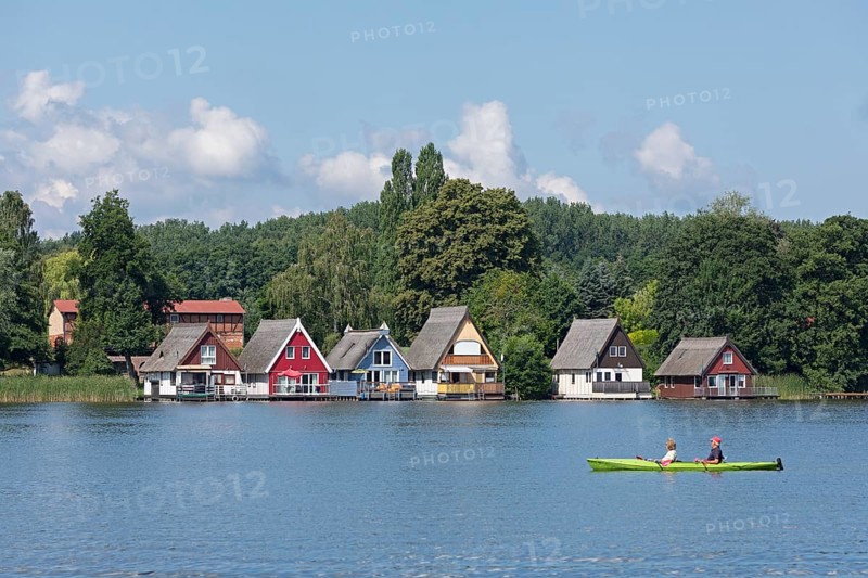 Boathouses, holiday homes on Lake Mirow, canoe, Mirow, Mecklenburg Lake District, Mecklenburg-Western Pomerania, Germany