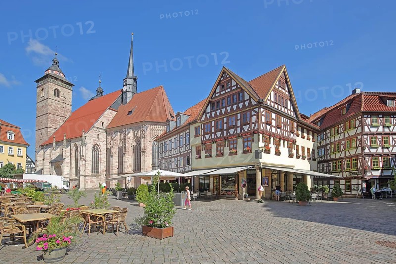 Late Gothic St George's Church and half-timbered houses with pedestrians, Altmarkt, Schmalkalden, Franconia, Thuringia, Germany