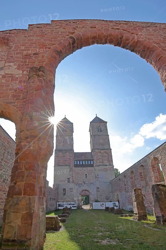 Romanesque St. Mary's Collegiate Church backlit with archway, twin towers, church ruins, interior view, view upwards, museum, Veßra Monastery, cobblestone, Thuringia, Germany