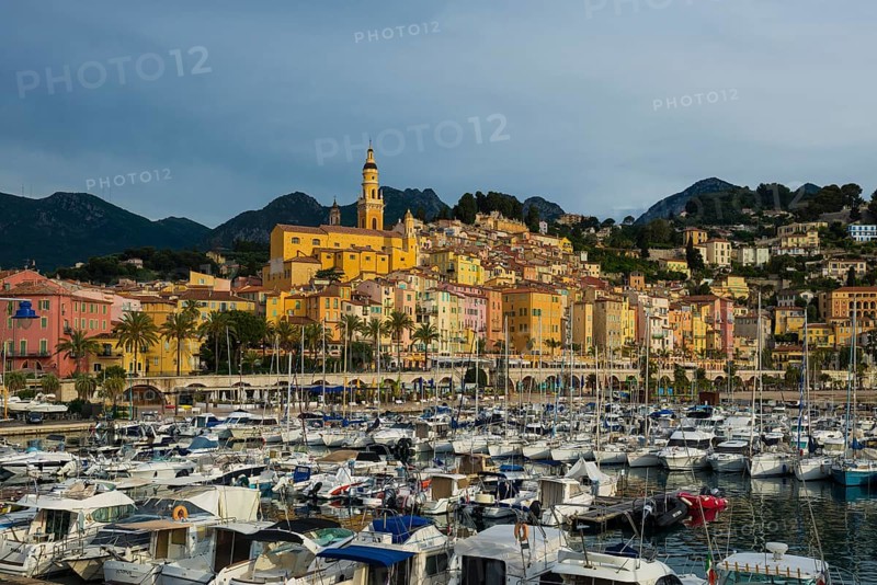 Town with colourful houses by the sea, sunrise, Menton, Alpes Maritimes, Provence Alpes Cote d'Azur, French Riviera, South of France, France