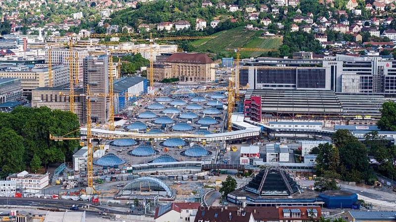 Stuttgart Central Station. The Stuttgart 21 construction site, where the new through station is being built. The 27 skylights, which naturally illuminate the future through station, are a characteristic feature. On the right are the current platforms of the terminus station. Stuttgart, Baden-Württemberg, Germany